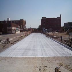 DCC performing the demolition of the Monticello IGA 