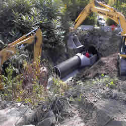 DCC performing the demolition of the Monticello IGA